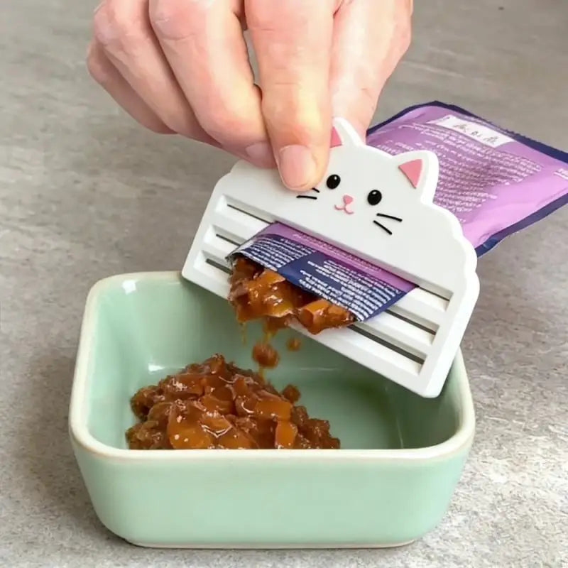 SqueezePaw™ Pet Food Squeezer